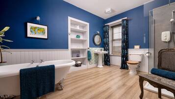 Shower, eco-friendly toiletries, hair dryer, towels