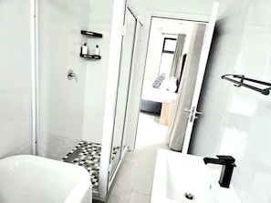 Hair dryer, towels, soap, toilet paper