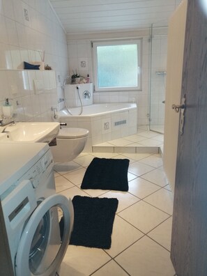 Jetted tub, hair dryer, towels, soap