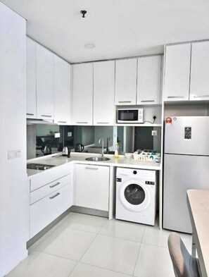 Standard Studio, 1 Queen Bed, Balcony, City View | Private kitchen | Full-size fridge, microwave, dishwasher