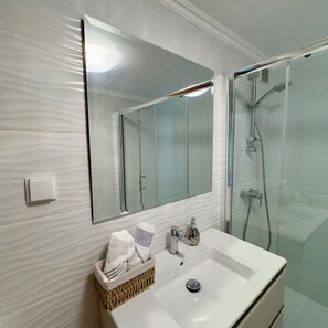 Shower, towels, soap, shampoo