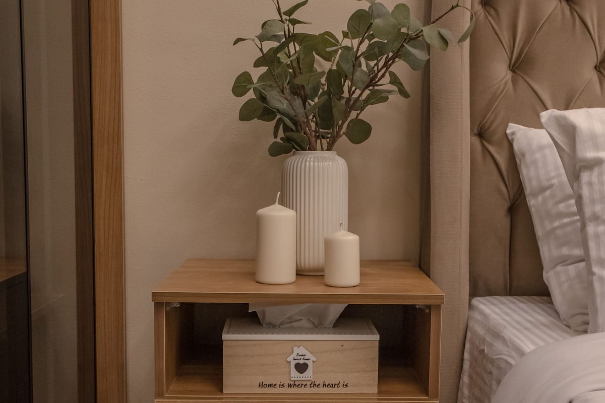 Deluxe Apartment, Garden View | Minibar, in-room safe, laptop workspace, iron/ironing board