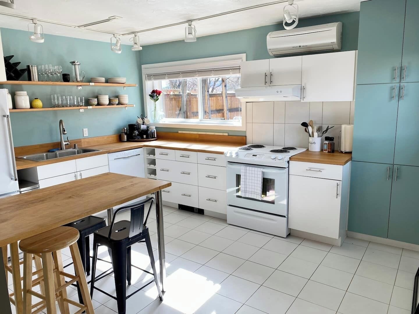 Upon entering you'll be in the open-concept, well-appointed kitchen with table seating for four.  