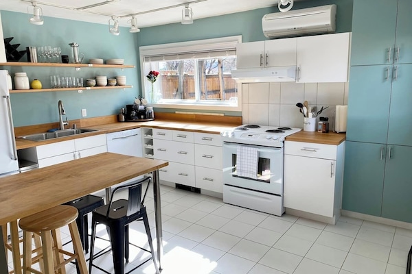 Upon entering you'll be in the open-concept, well-appointed kitchen with table seating for four.