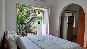 Deluxe Room, Balcony, Garden View | Premium bedding, cots/infant beds, free WiFi, bed sheets
