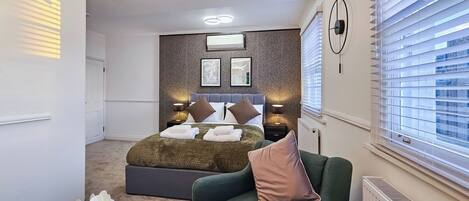 2 عدّة غرف نوم ومكواة/لوح كي وواي فاي مجانًا وملاءات أسرّة