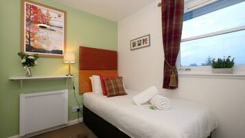 2 slaapkamers, een strijkplank/strijkijzer, gratis wifi, beddengoed