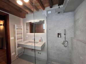 Shower, eco-friendly toiletries, hair dryer, bidet