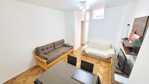 Appartement, 1 chambre, balcon, vue ville | Salle de séjour