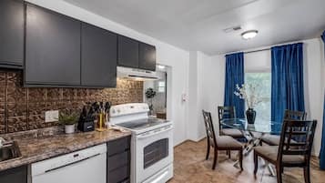 Apartment, 2 Bedrooms | Private kitchen | Fridge, oven, coffee/tea maker