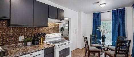 Apartment, 2 Bedrooms | Private kitchen | Fridge, oven, coffee/tea maker