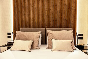 Habitación Confort | Caja fuerte, escritorio, cortinas opacas y sistema de insonorización