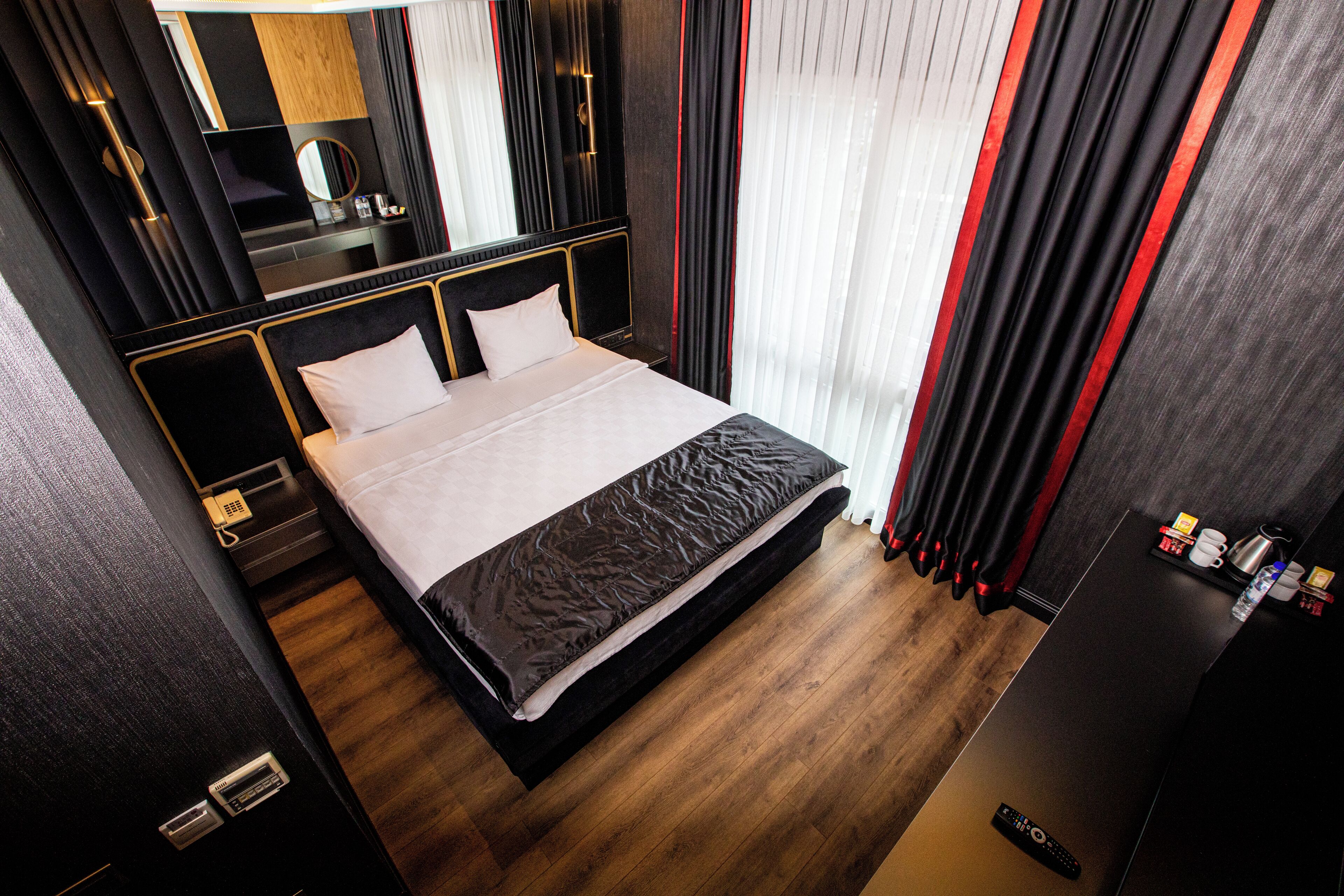 In-room safe, laptop workspace, blackout drapes, soundproofing