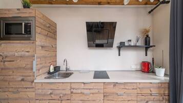 Fridge, microwave, stovetop, cookware/dishes/utensils