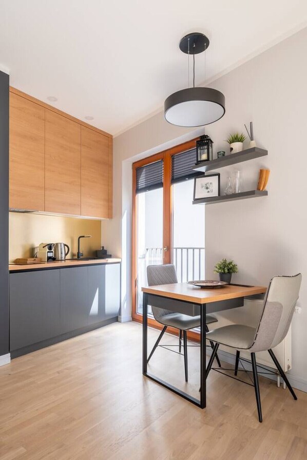 Dining - Cosy studio apartment in Ridzenes residence (Riga)