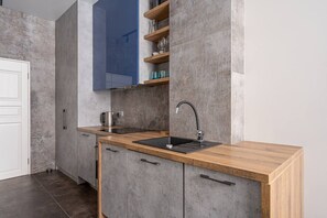 Fridge, stovetop, cookware/dishes/utensils, dining tables