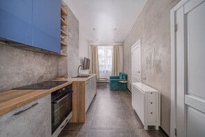 Fridge, stovetop, cookware/dishes/utensils, dining tables