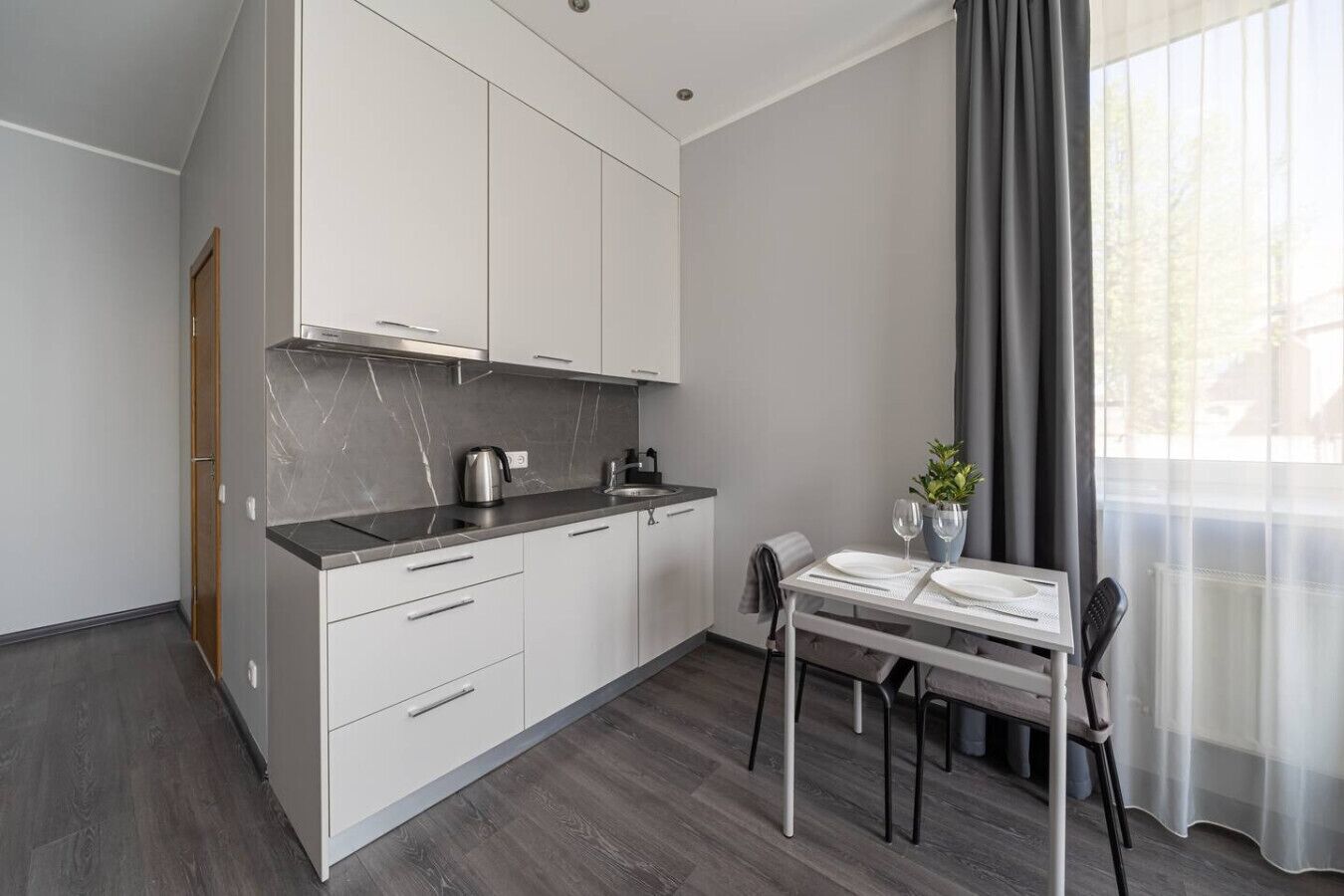 Fridge, stovetop, coffee/tea maker, cookware/dishes/utensils