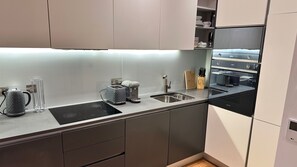 Apartment | Private kitchen | Fridge, microwave, oven, stovetop