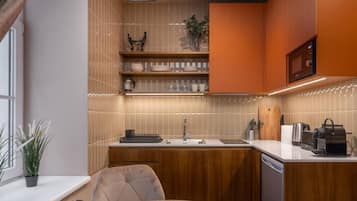 Fridge, microwave, stovetop, coffee/tea maker