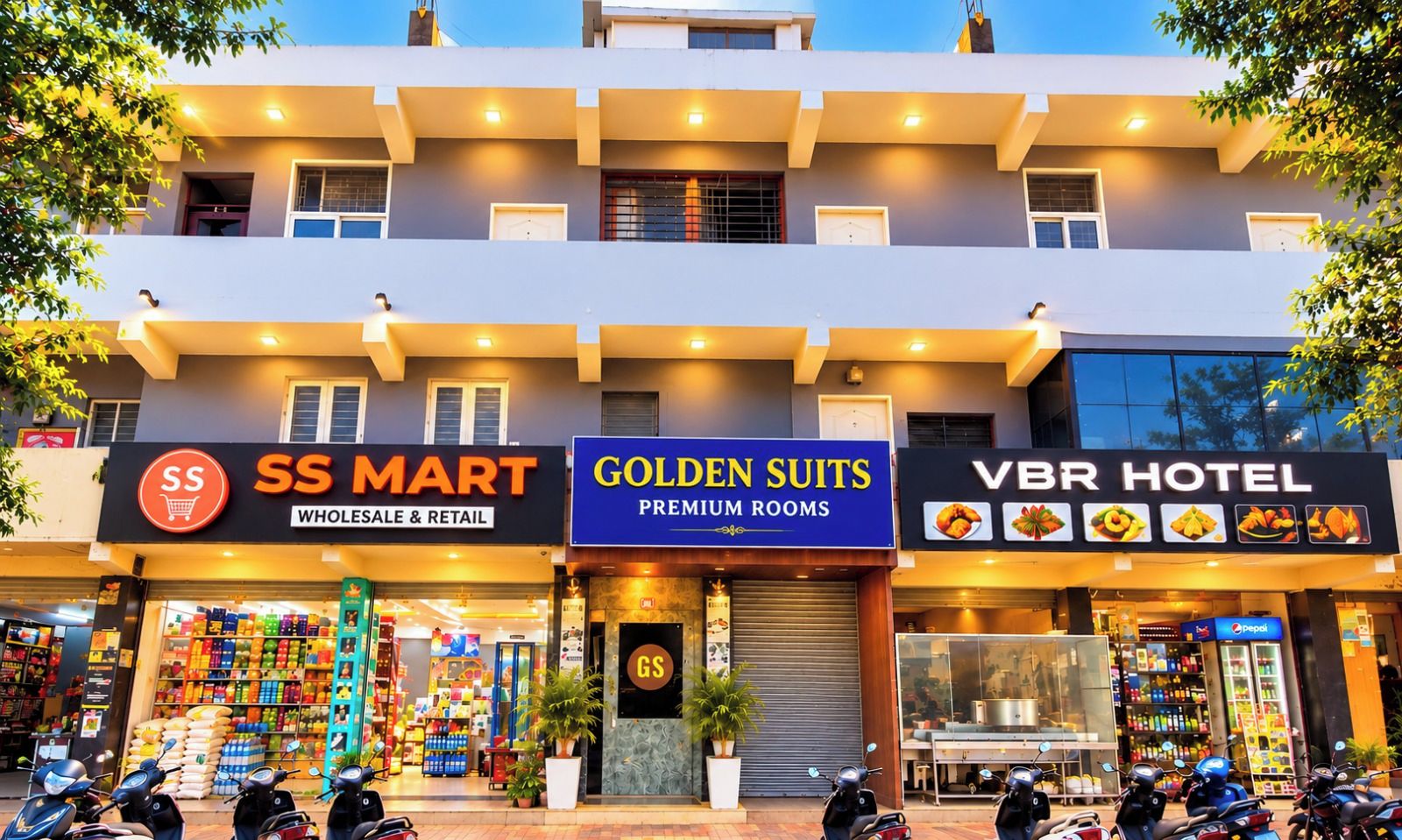 A multi-story building with a ground floor featuring a SS Mart, a Golden Suits Premium Rooms, and a VBR Hotel.