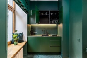 Fridge, stovetop, electric kettle, toaster