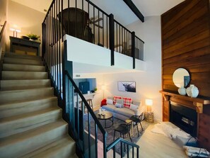 Smart TV, fireplace, books