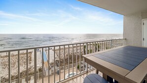 A balcony with a view of the beach and ocean. - Ocean House 1403 by Liquid Life (Gulf Shores)