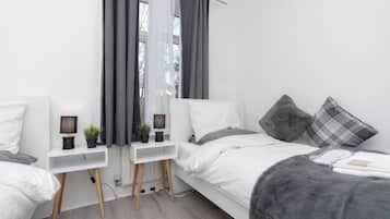 2 habitaciones, tabla de planchar con plancha, wifi y ropa de cama
