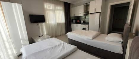 Studio Ăconomique, balcon, vue ville | 1 chambre, Wi-Fi gratuit