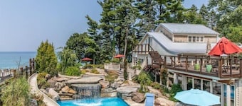 Colossal Union Pier Home with Lakefront, Pool, Hot Tub and More!