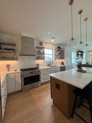 Fridge, microwave, oven, stovetop - Plan your getaway in our brand new 5-bedroom home in welcoming Bethany Beach. (Bethany Beach)