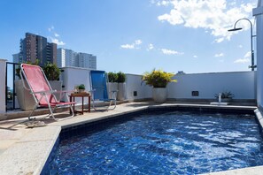 Outdoor pool - Cobertura com Piscina privativa e AC (Guarujá)