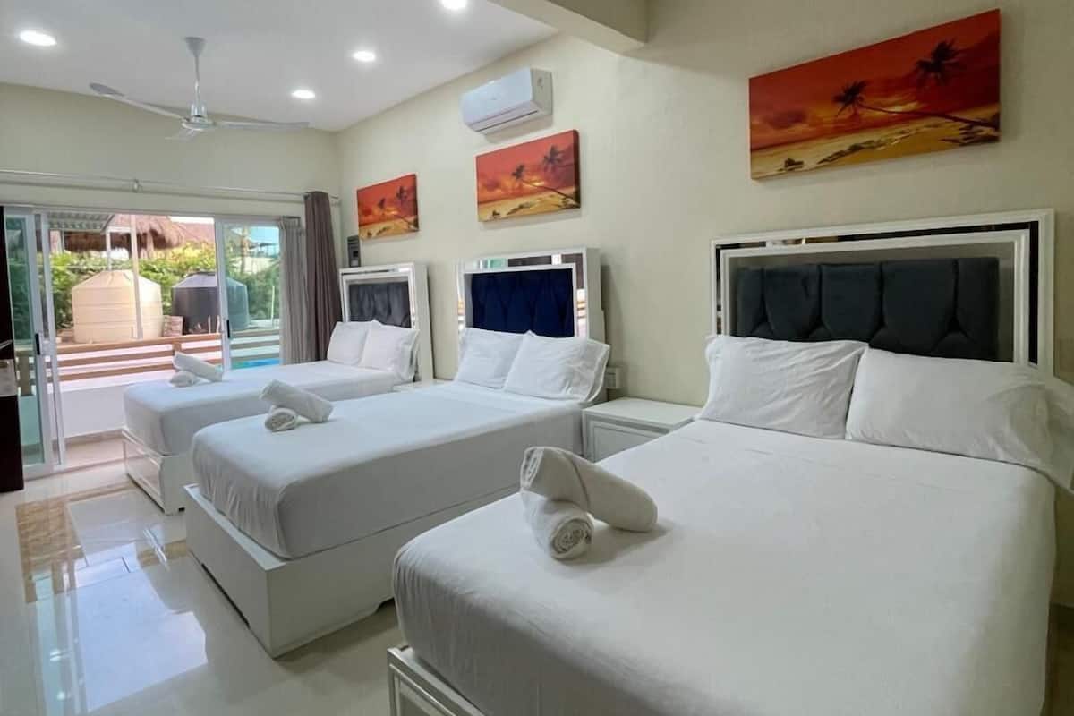 Tabla de planchar con plancha, wifi gratis y ropa de cama 