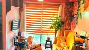 Apartamento clásico, vistas a la ciudad | Zona de estar