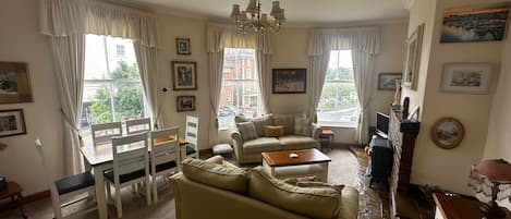 Apartment | Living area | TV, fireplace