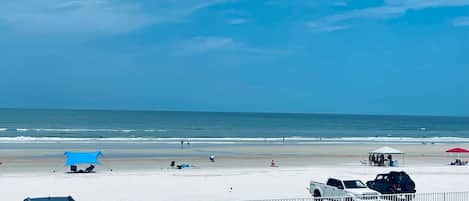On the beach, sun loungers, beach towels