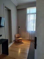 Habitación superior | Zona de estar | Smart TV de 40 pulgadas con canales digitales