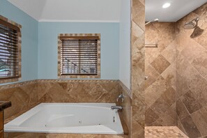 Shower, jetted bath, bidet, towels