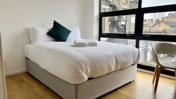 Apartamento, 2 quartos | 1 quarto, ferros/tábuas de passar roupa, Wi-Fi de cortesia