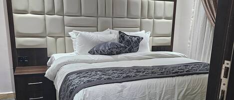 Suite Deluxe, 1 trĂšs grand lit, coin cuisine | 1 chambre, Wi-Fi gratuit, draps fournis