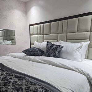 Suite Deluxe, 1 cama King size, cocineta | 1 habitación, wifi gratis y ropa de cama 