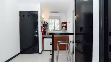 Fridge, microwave, stovetop, coffee/tea maker