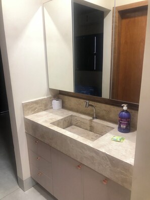 Shower, towels, soap, toilet paper