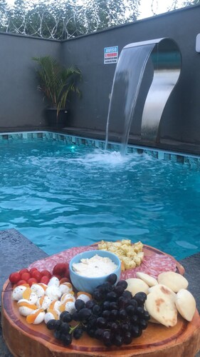 House with heated pool close to the center and Flamboyant, pet friendly