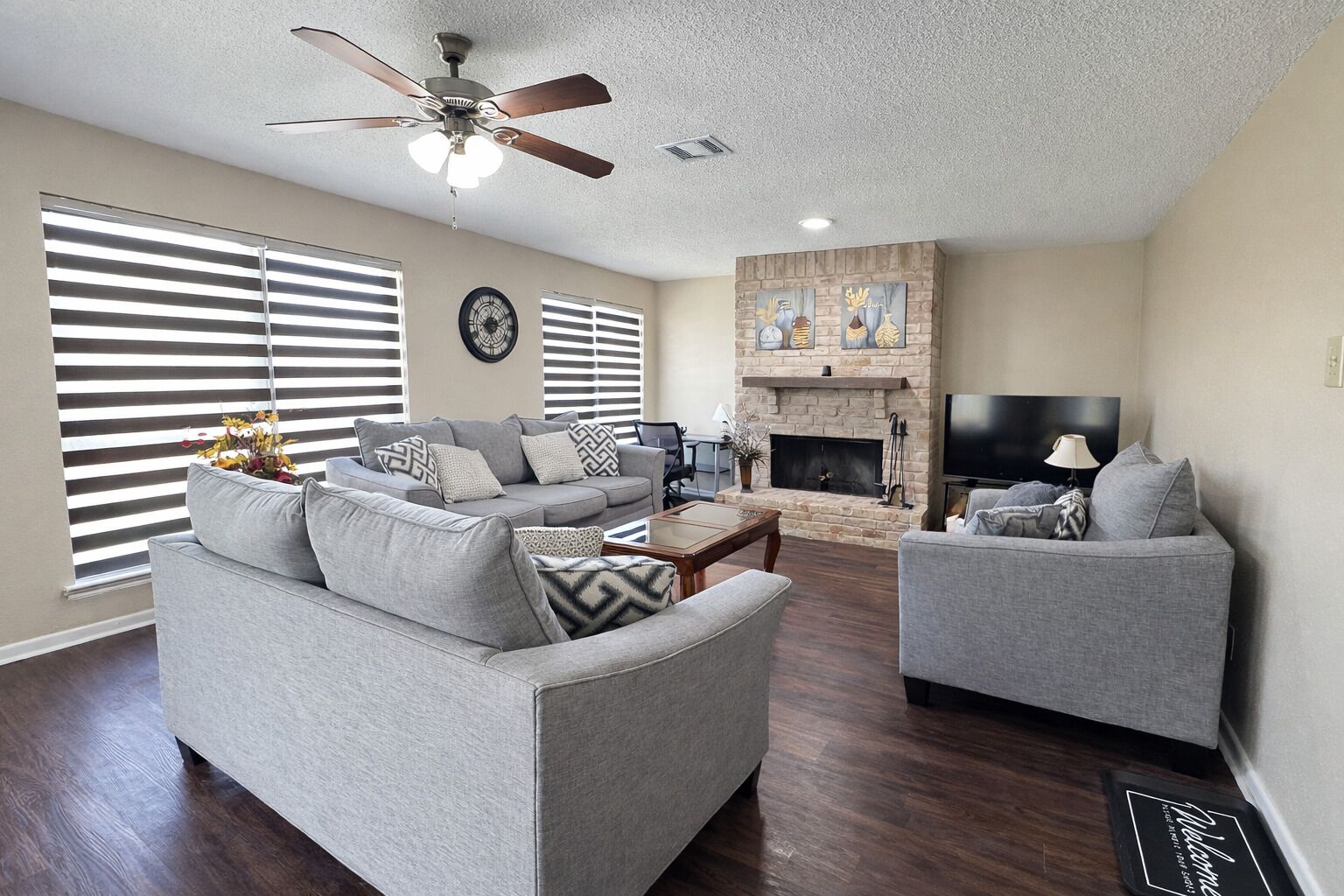 Smart TV, fireplace, books