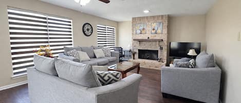 Smart TV, fireplace, books