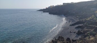 Quiet and relaxing cave with a deserted beach