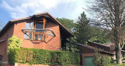 Spacious, family-friendly vacation apartment in architect's house with garden