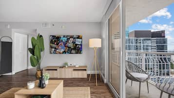 Condo, 2 Bedrooms, Balcony, Partial Ocean View | Living area | 50-inch plasma TV with cable channels